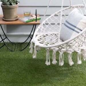 Grass carpet installed in villa outdoor area