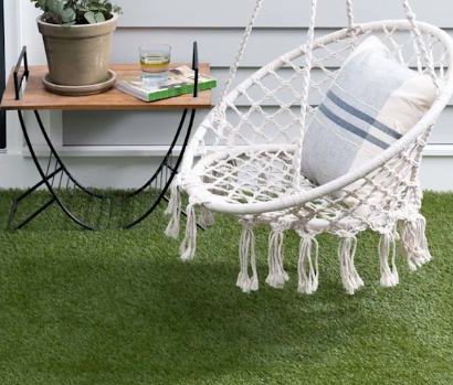 Grass carpet installed in villa outdoor area