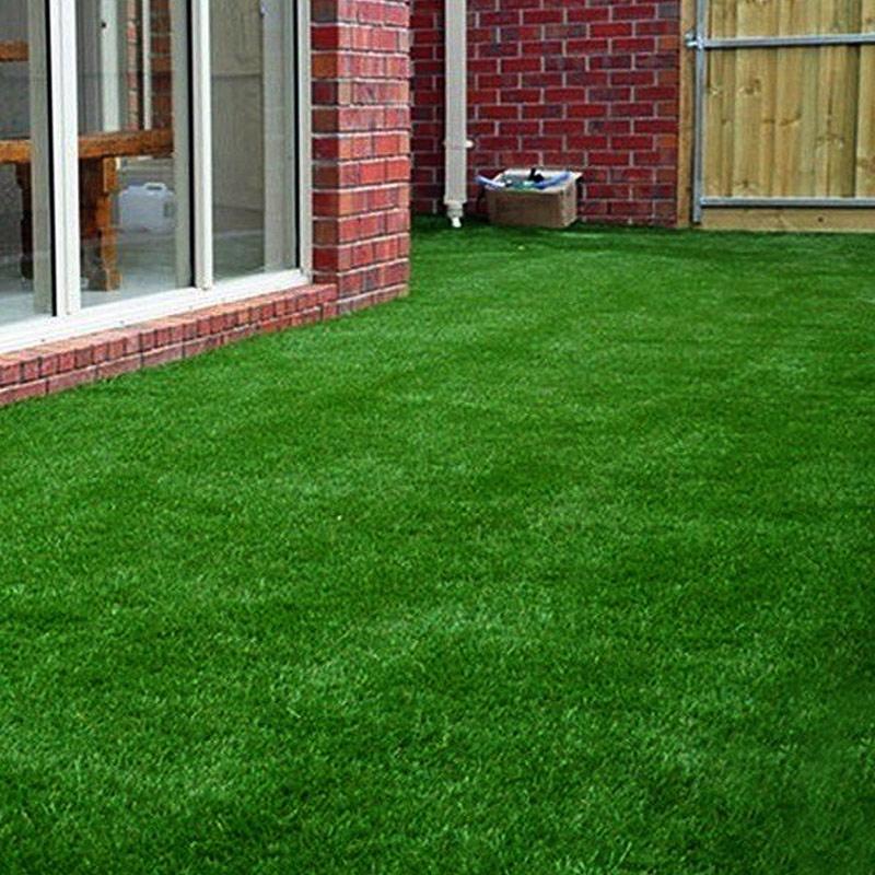 Garden landscaping with synthetic grass carpet